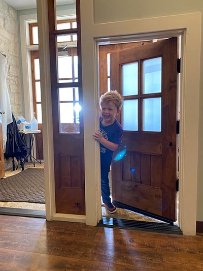 young child laughing while visiting Smiles of Austin